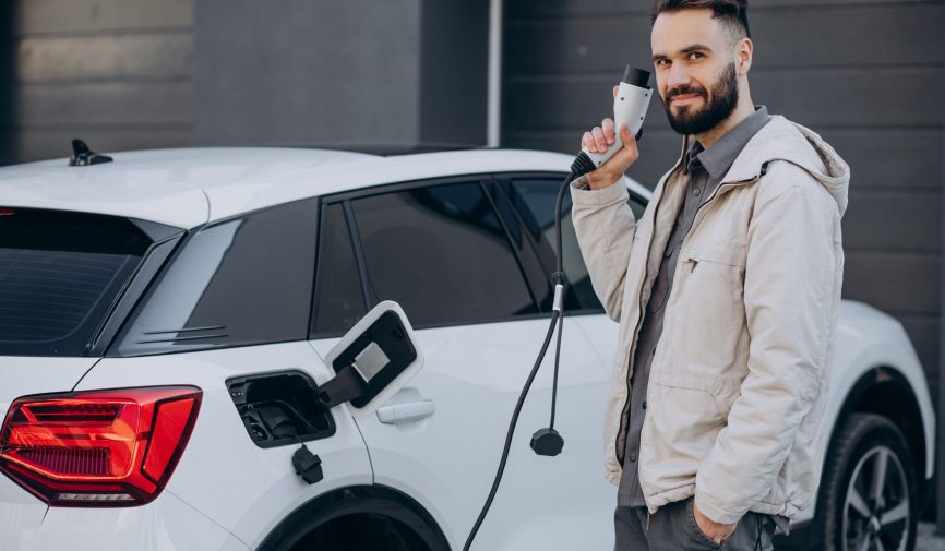 Man charging electric car by the house Collage of people buying, selling, and driving cars including luxury vehicles, electric cars, car dealerships, and family car transactions.