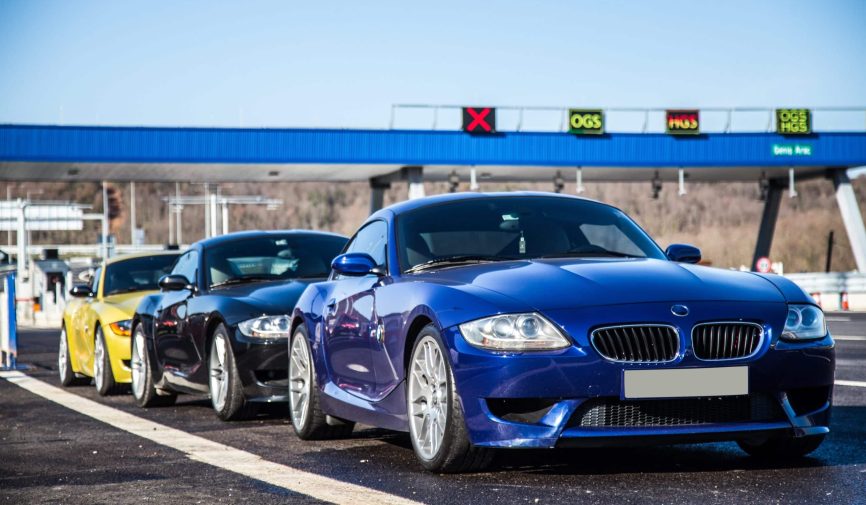 Our Favourite Cars of 2024 Collage of people buying, selling, and driving cars including luxury vehicles, electric cars, car dealerships, and family car transactions.